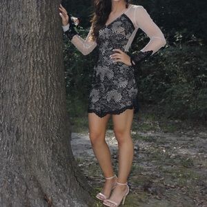 Black and nude laced homecoming dress.